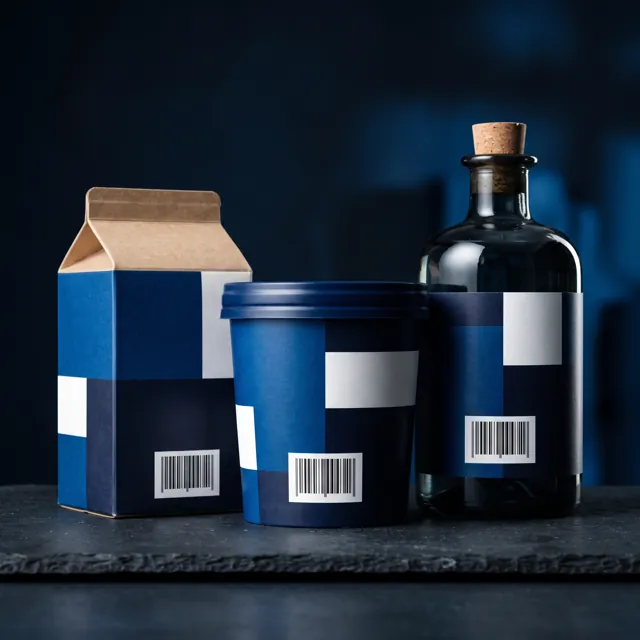 A carton, tub and bottle each carrying a printed barcode label