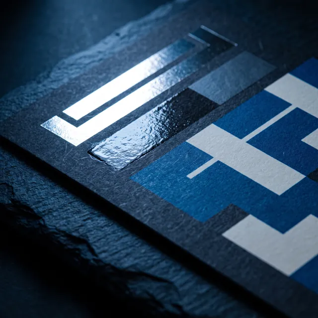 Macro of a finished label showing cold foil, spot varnish and matt laminate