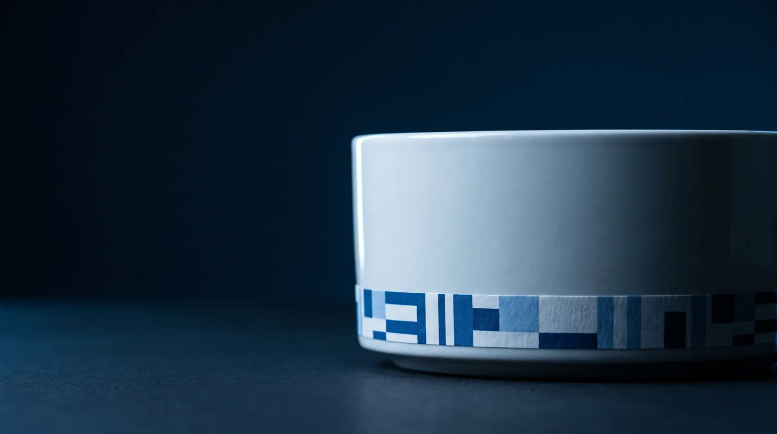 A tub with a decorative band label wrapping its base