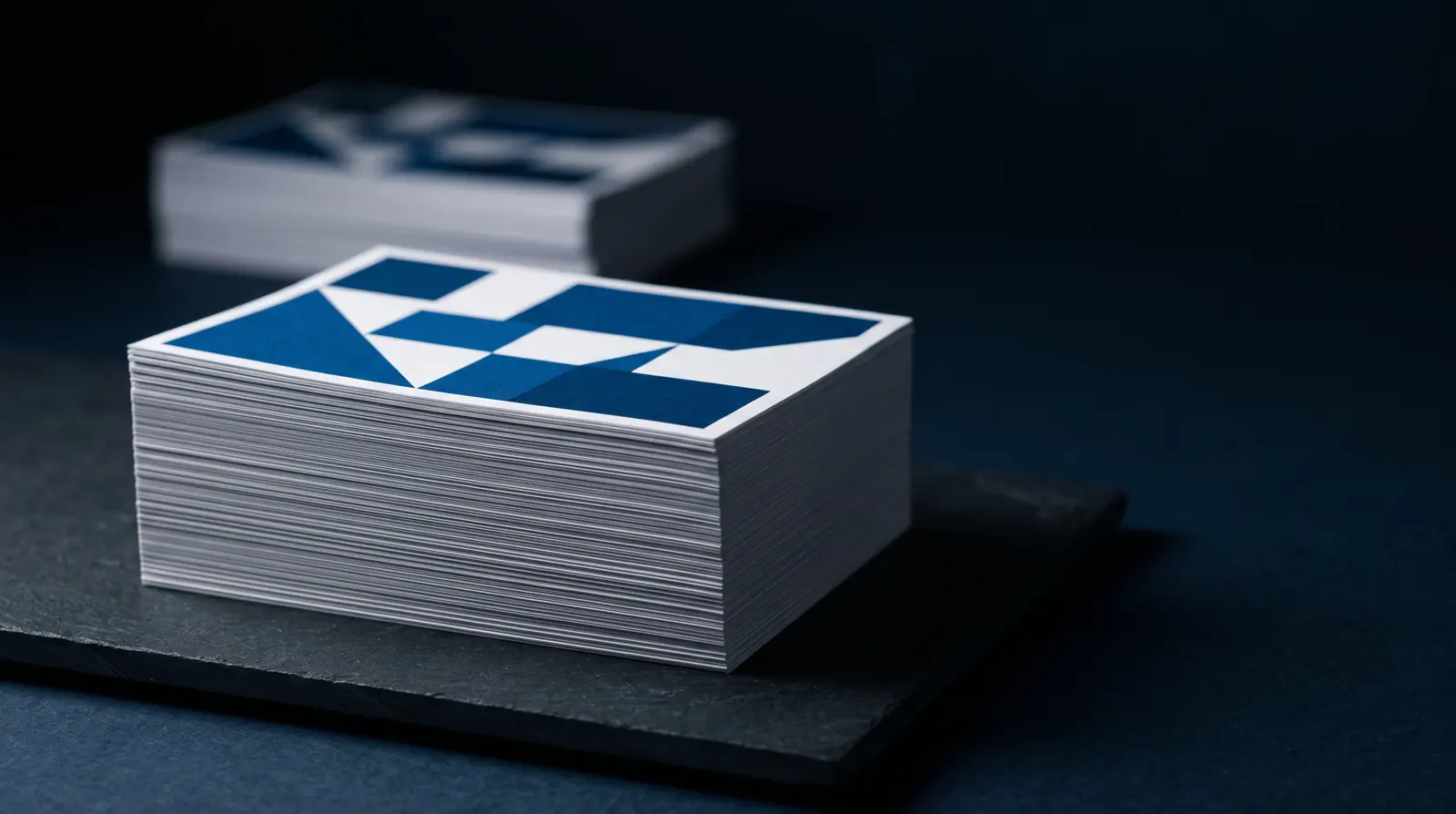 A guillotined stack of sheeted labels with razor-sharp edges