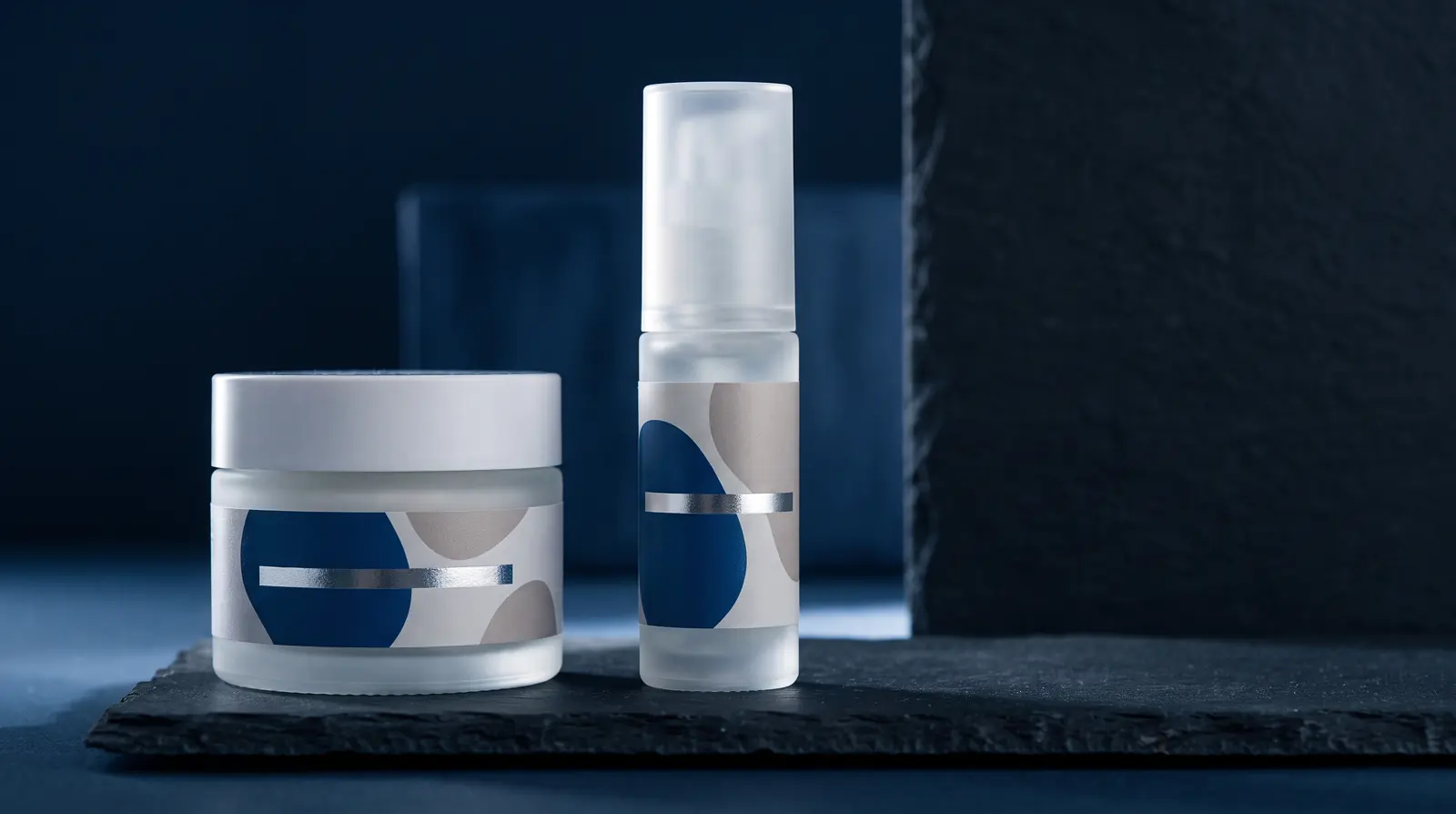 A frosted cosmetic jar with a matt-laminated label and a cold-foil band